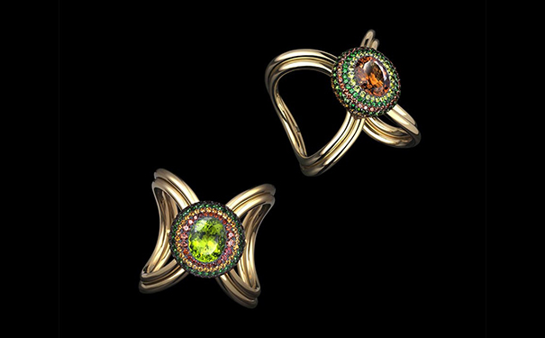 镶嵌圆形切割橄榄石、碧玺、尖晶石和石榴石。 镶嵌圆形切割橄榄石、碧玺、尖晶石和石榴石。