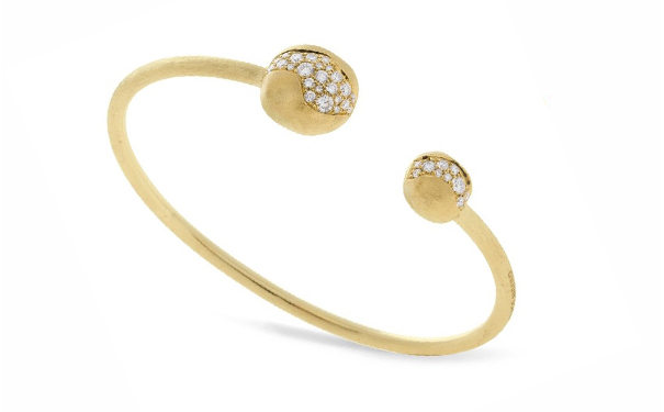 镶嵌总重0.72ct的圆形切割钻石。