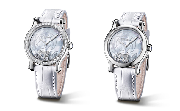 蓝宝石、海蓝宝石、托帕石、碧玺和钻石铺陈出渐变色调的表盘背景