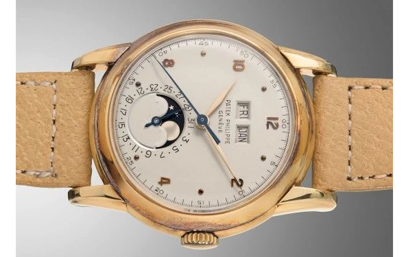 百达翡丽，型号2497，极度精细及罕有，18K黄金腕表，配万年历﹑中心秒针和月相显示，1951年制。附后补证书  成交价：362,500美元