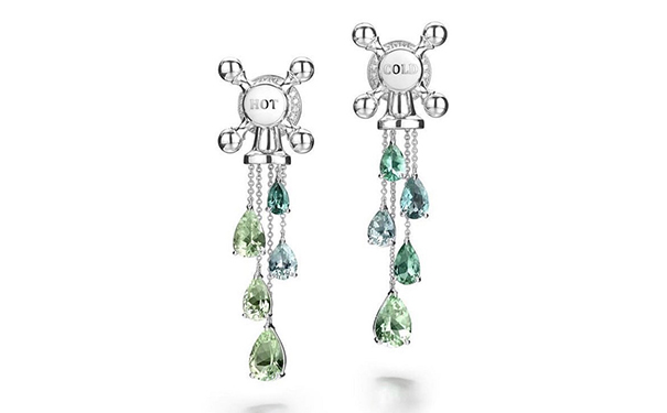 白金耳钉，by Suzanne Syz  镶嵌帕拉伊巴碧玺和钻石。